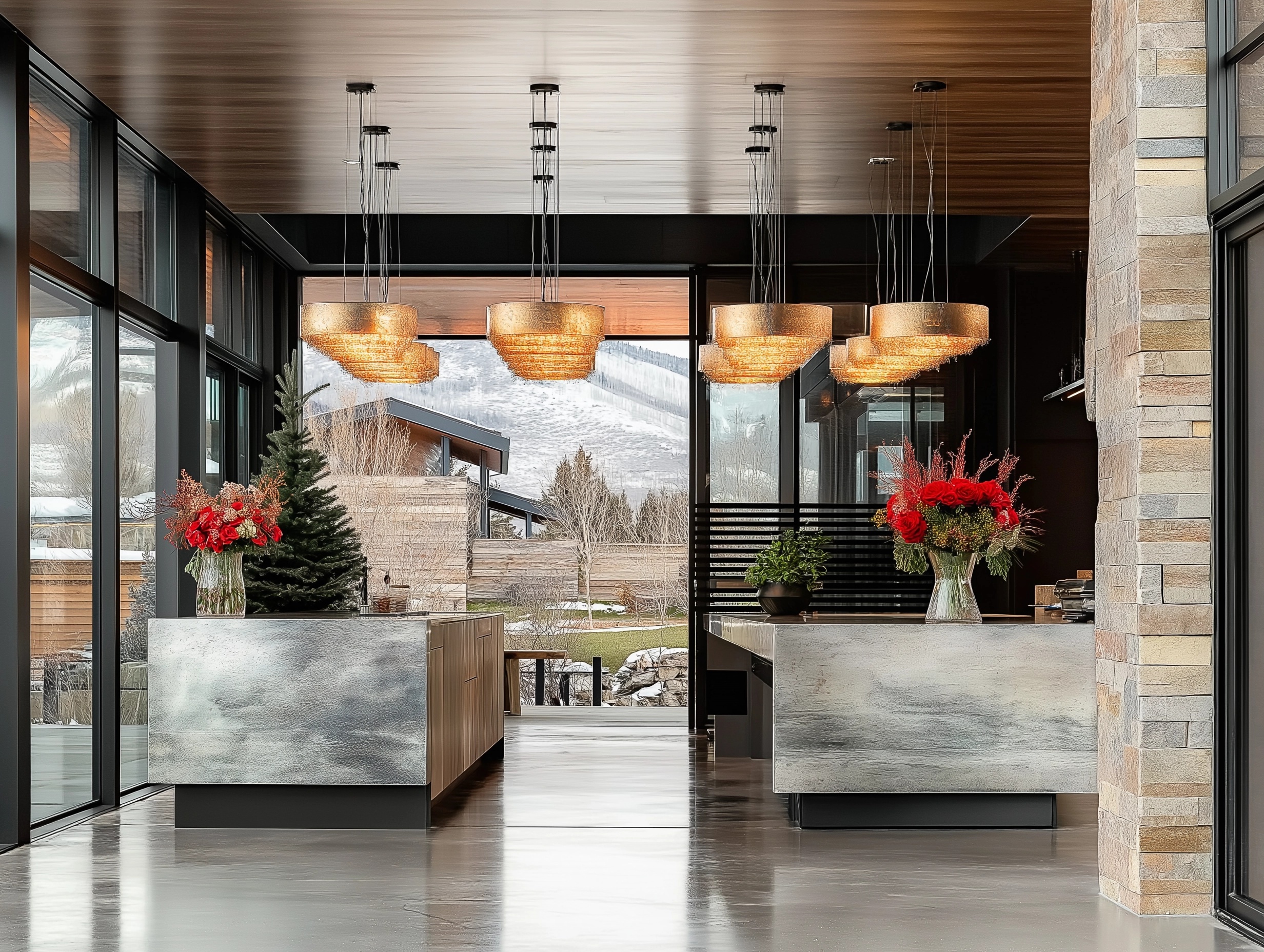 A dramatic arrangement of gold pendant lights in a contemporary mountain home in Park City, Utah. Hanging in a space with dark marble walls and soft wooden accents, each pendant emits a warm golden glow. Reflections from the polished surfaces create a cozy yet refined ambiance. The overall design blends luxury with the natural serenity of the Utah landscape